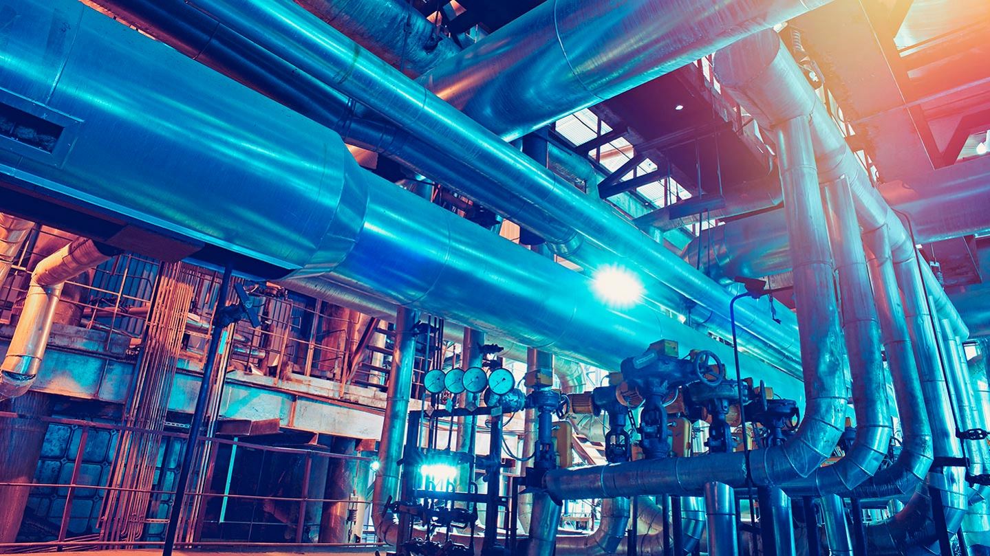 quipment and piping inside of a modern industrial power plant