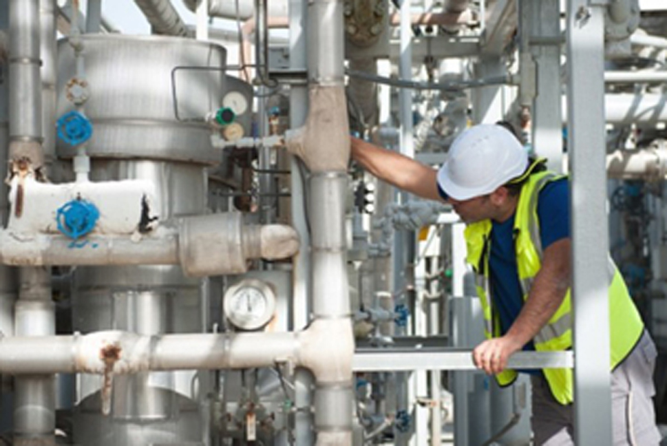 Oxar technician at industrial gas plant
